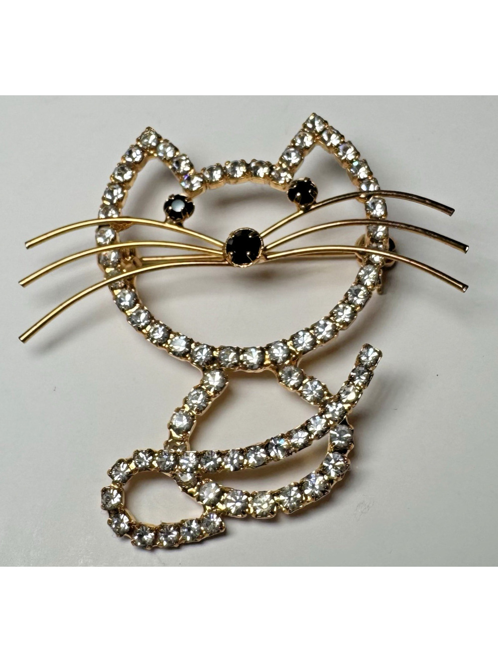 Vintage Rhinestone Cat Brooch Gold Tone Kitty Pin Black Eyes Figural Jewelry